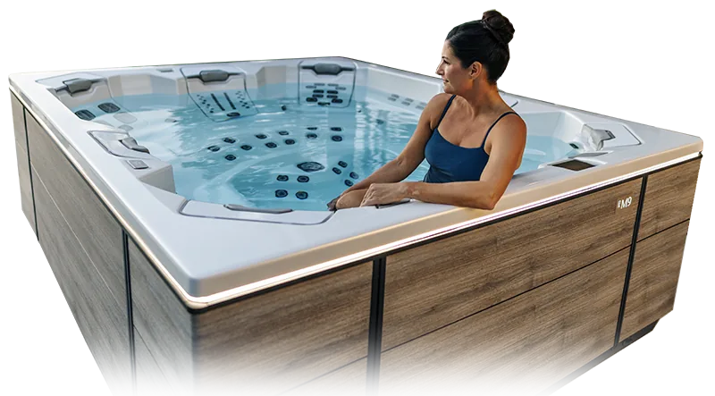 Woman relaxing in a Bullfrog M9 hot tub